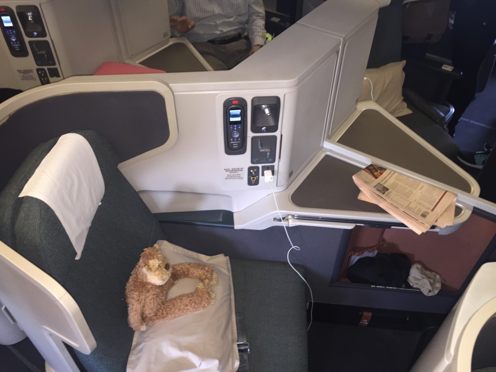 a stuffed animal on a pillow