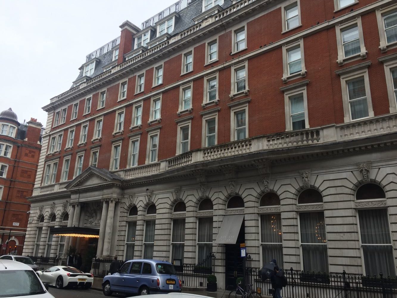 a building with cars parked on the side of it