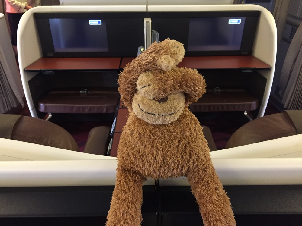 a stuffed animal in a chair