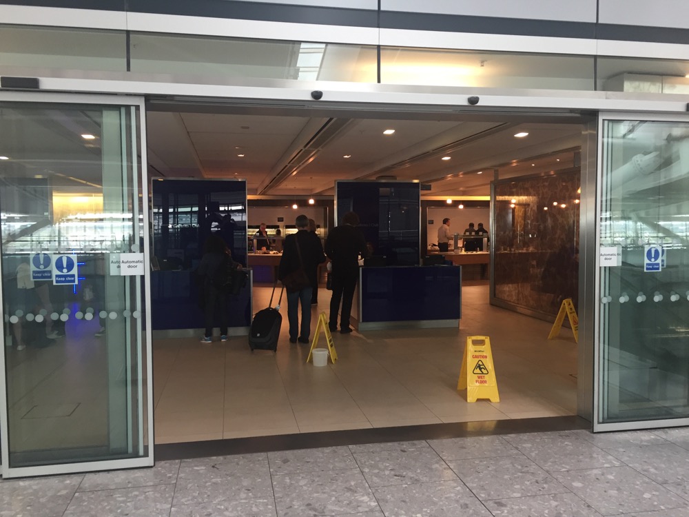people standing in a building with a group of people