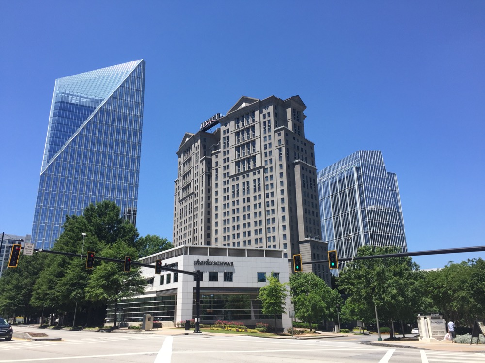 a group of tall buildings in a city