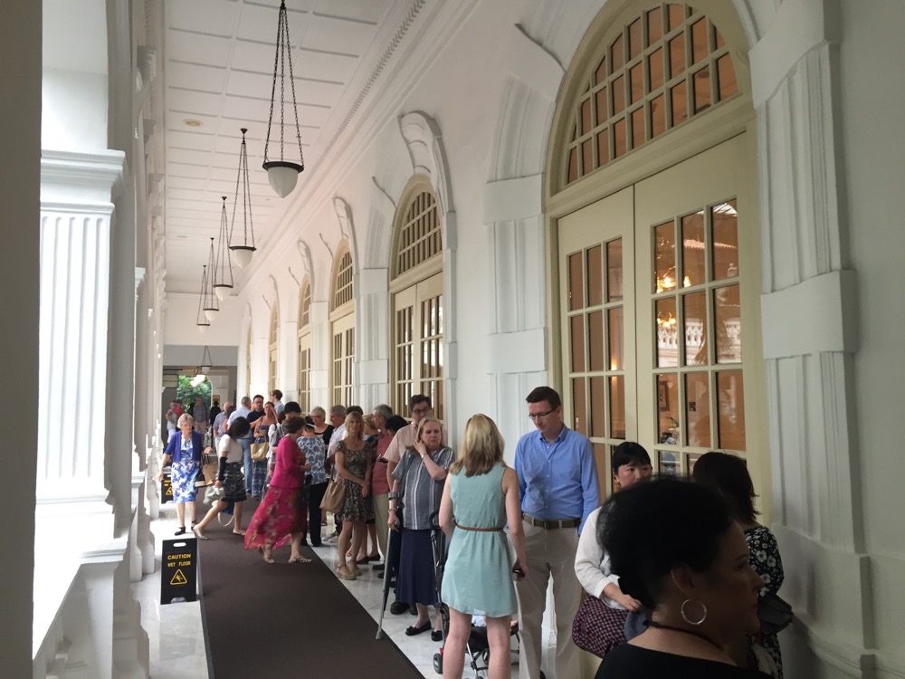a group of people in a hallway