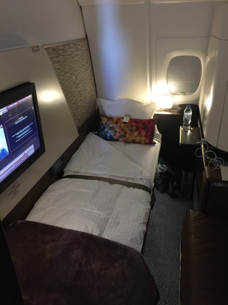 a bed in a plane