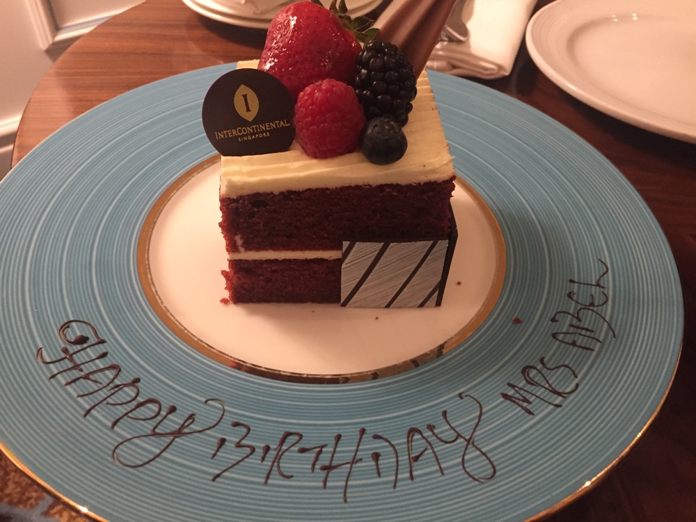 a piece of cake with berries on a plate