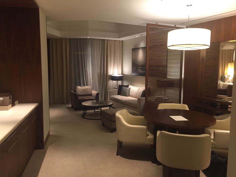 a room with a table and chairs