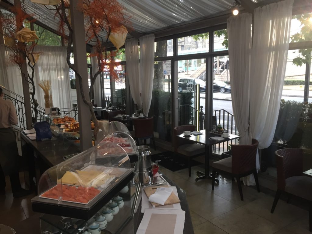 a restaurant with tables and chairs
