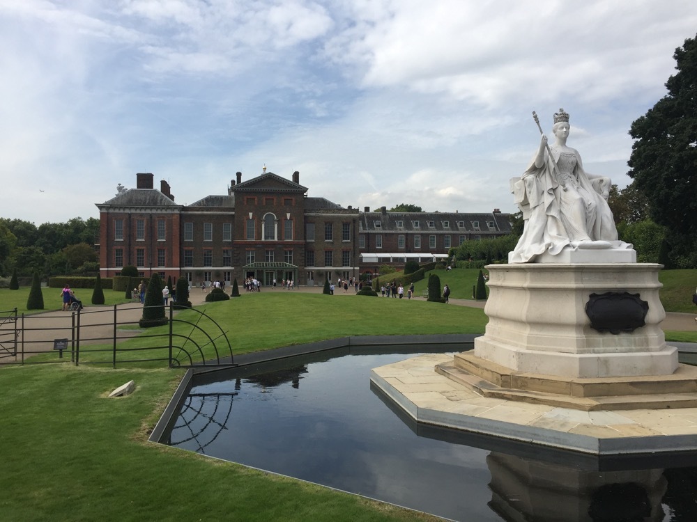 a statue of a woman in a park