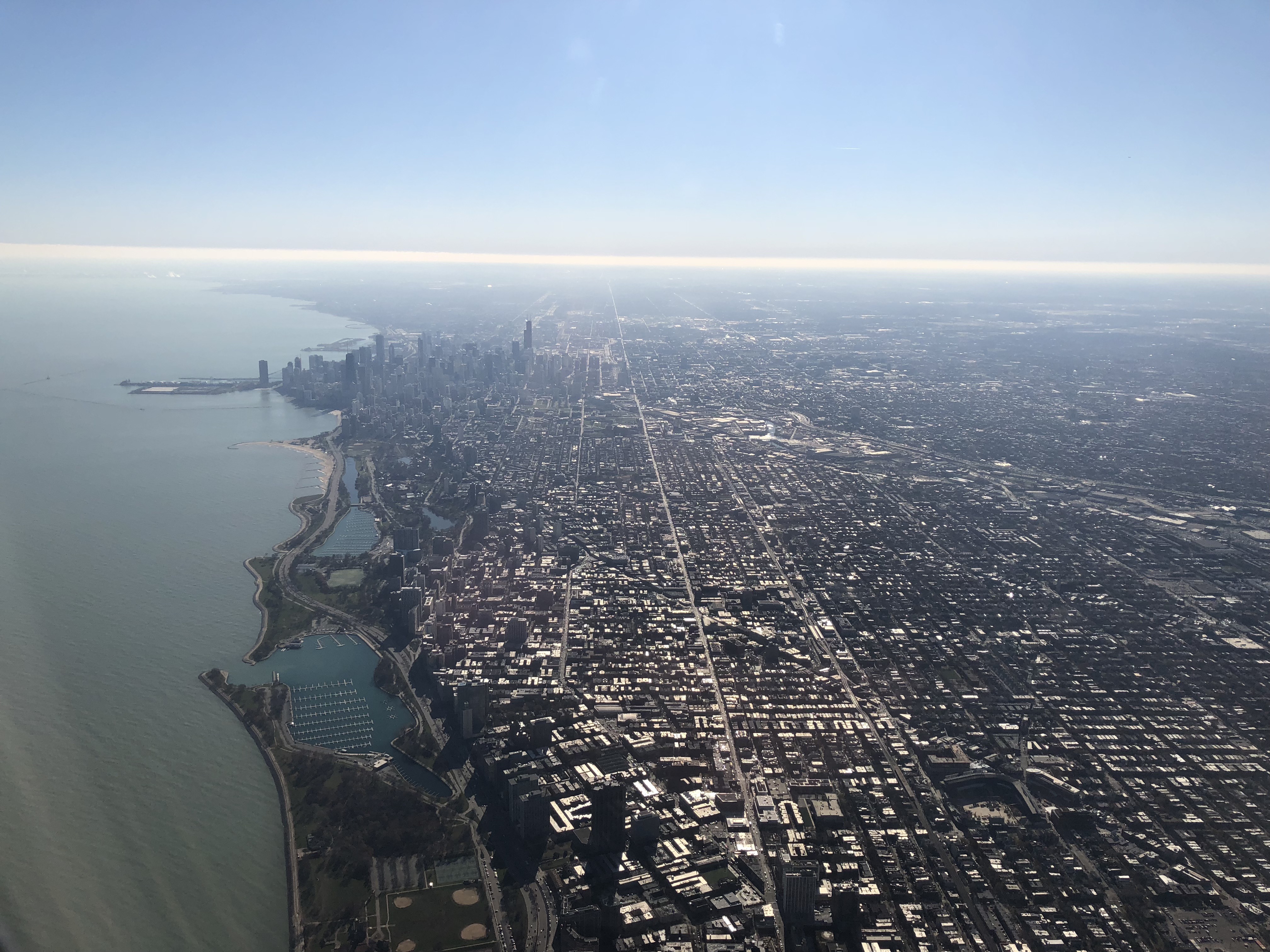 an aerial view of a city and water
