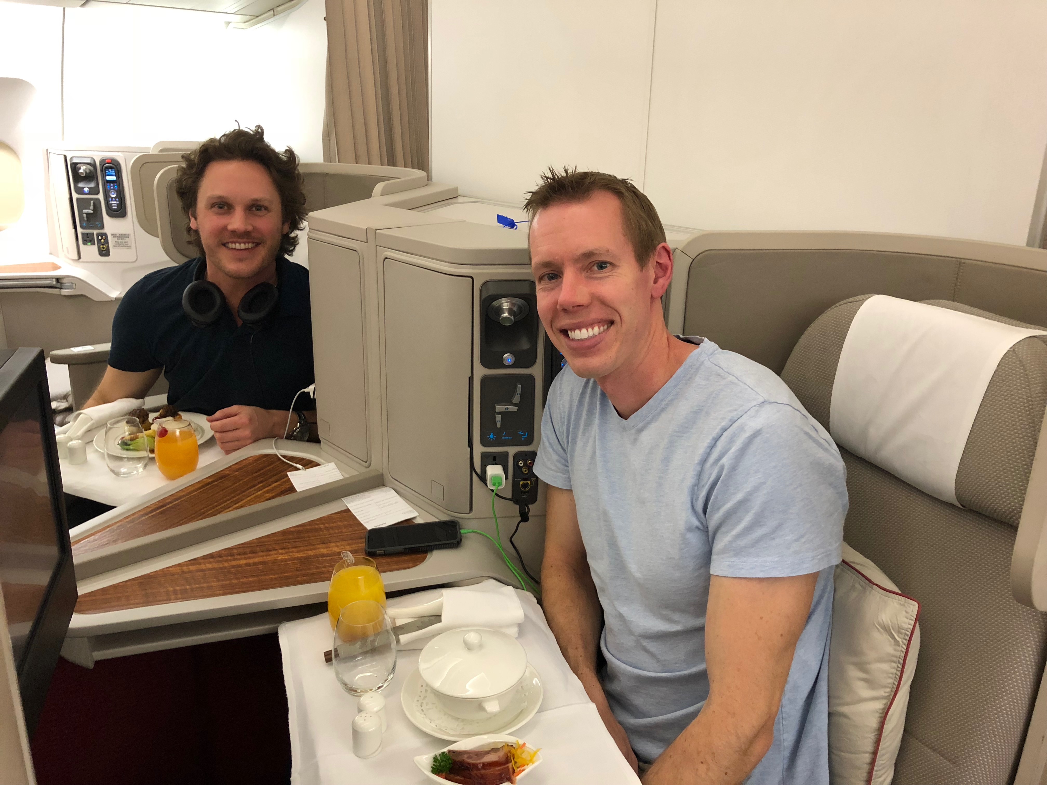 two men sitting at a table