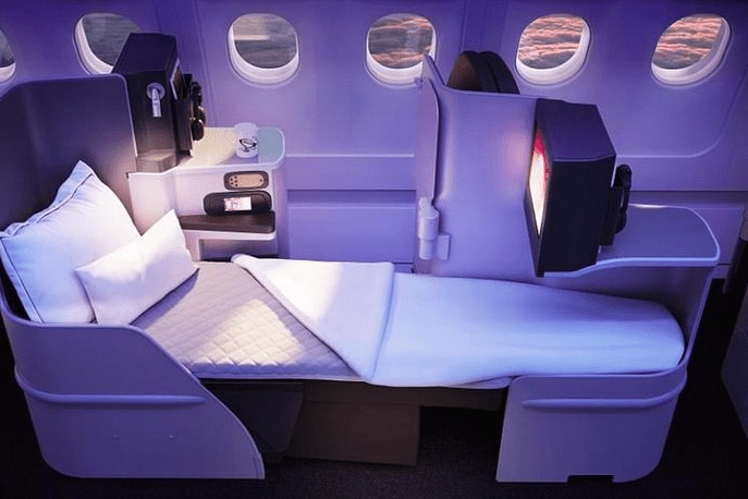 a bed in a plane