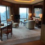 a room with a television and a table