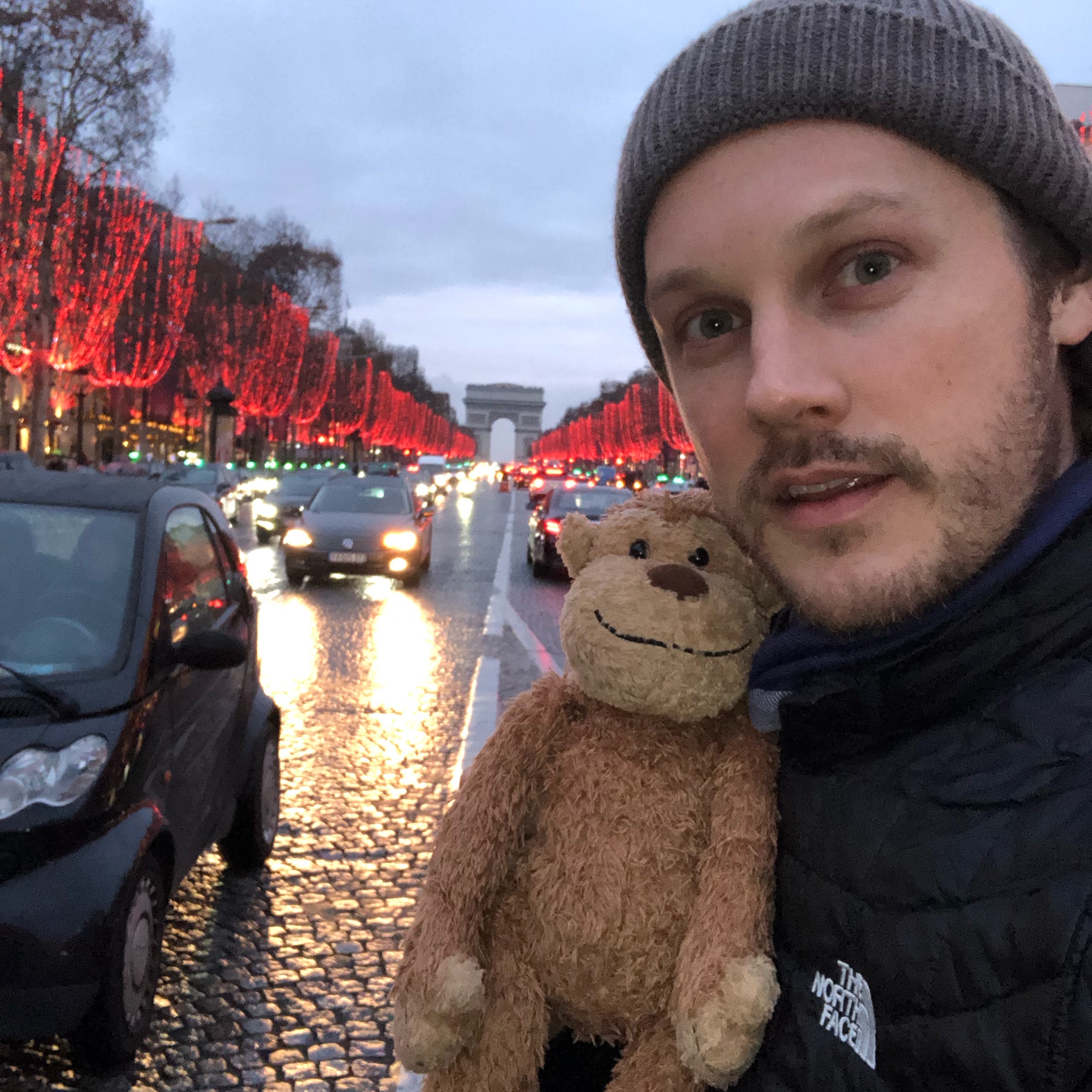 a man holding a stuffed animal
