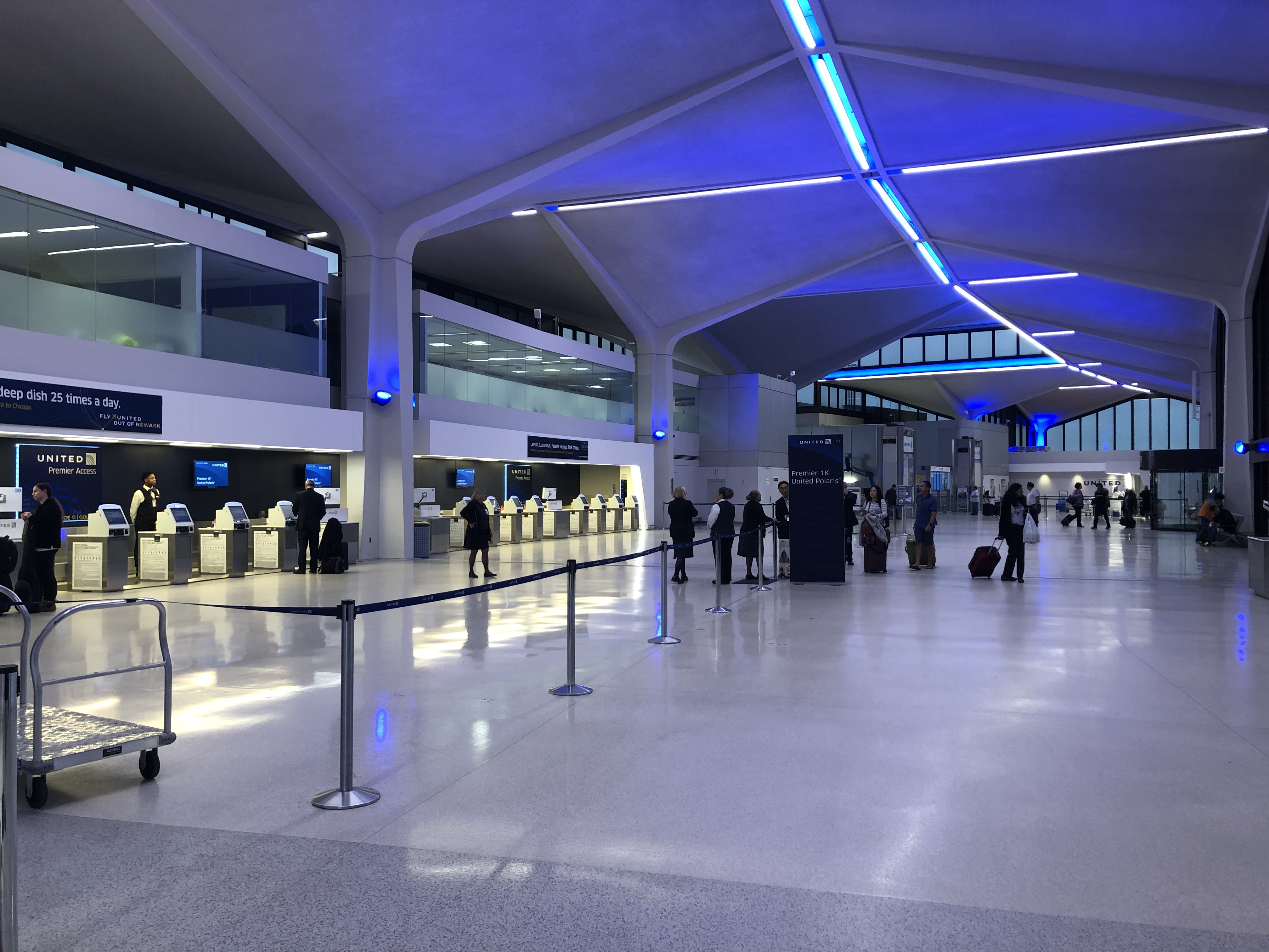 a group of people in a large airport