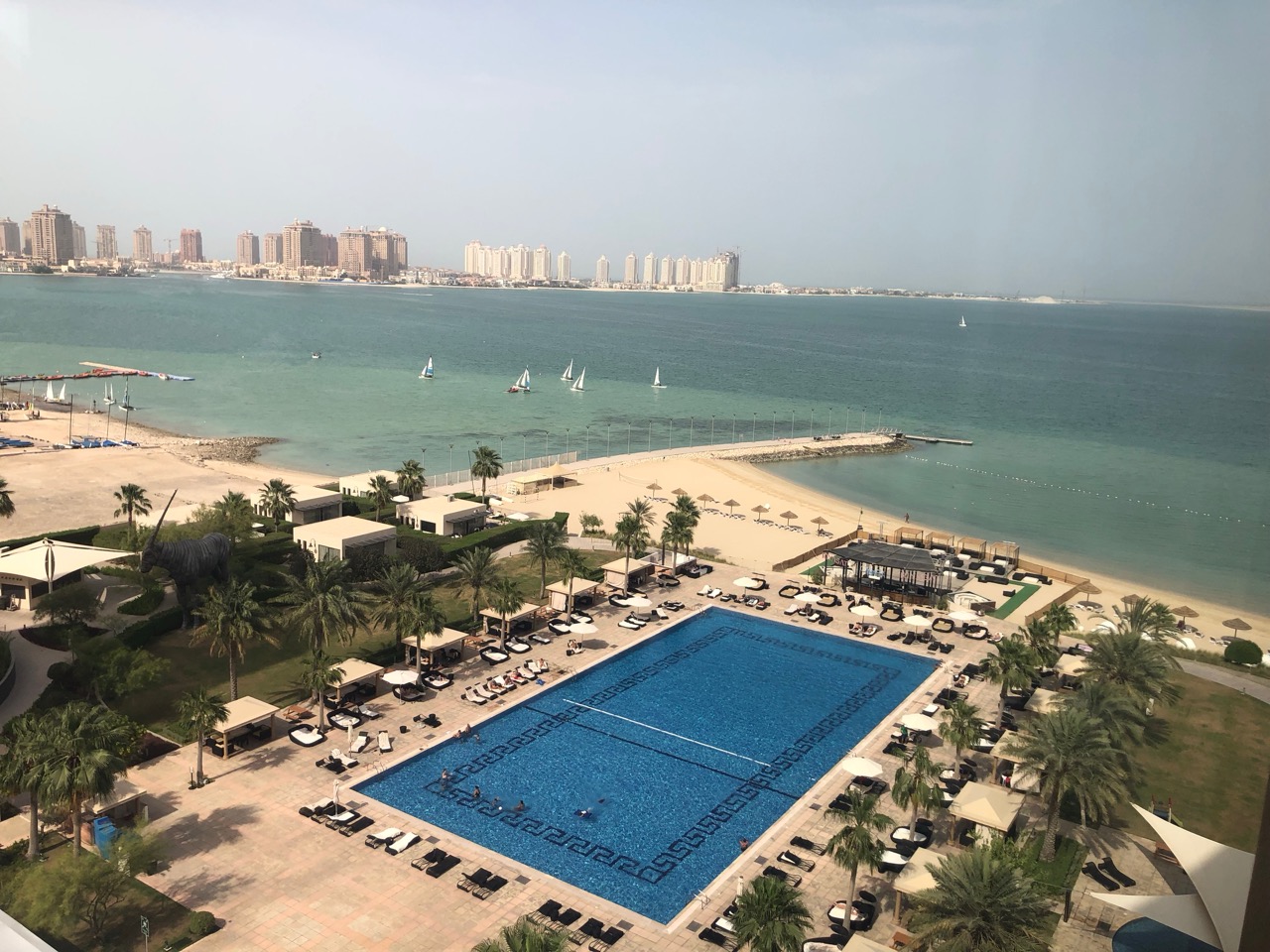 a swimming pool on a beach