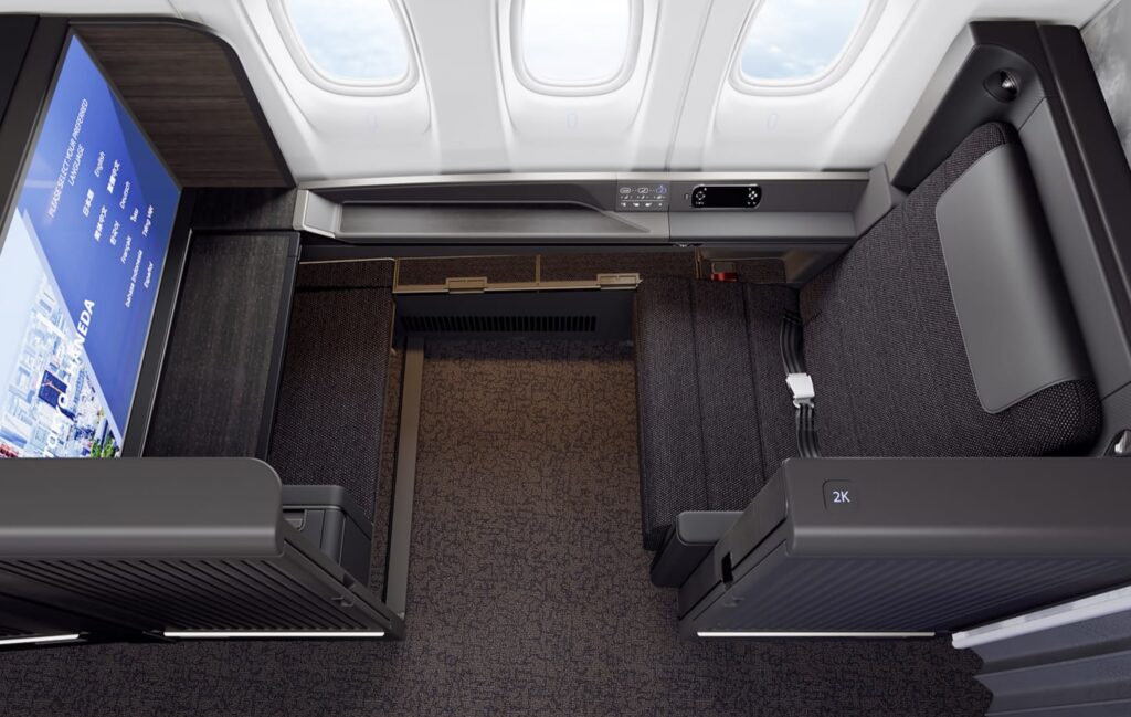 an airplane seat with seats and windows