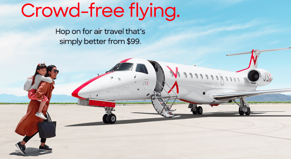 a white airplane with red stripes