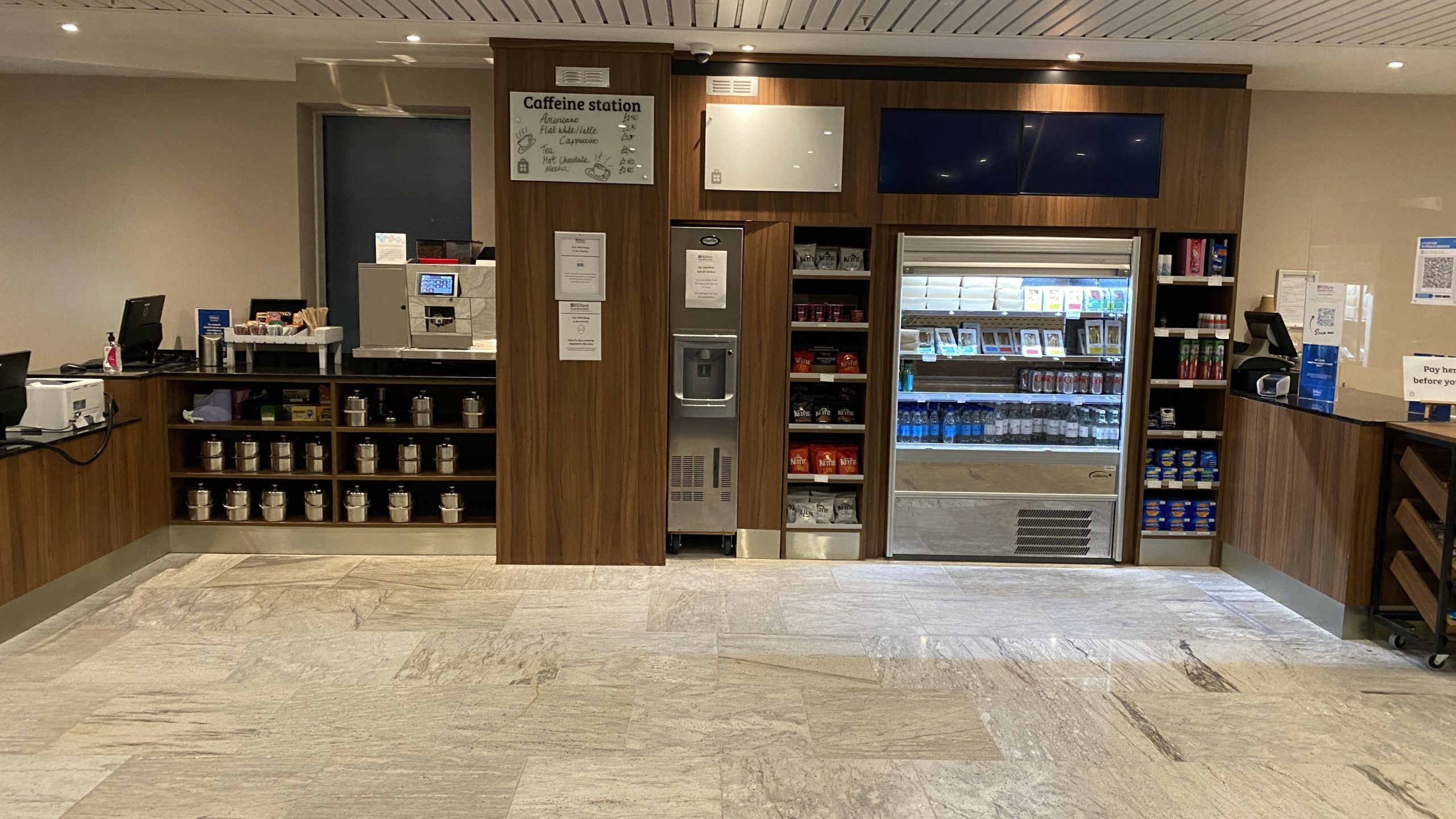 a coffee shop with shelves and shelves