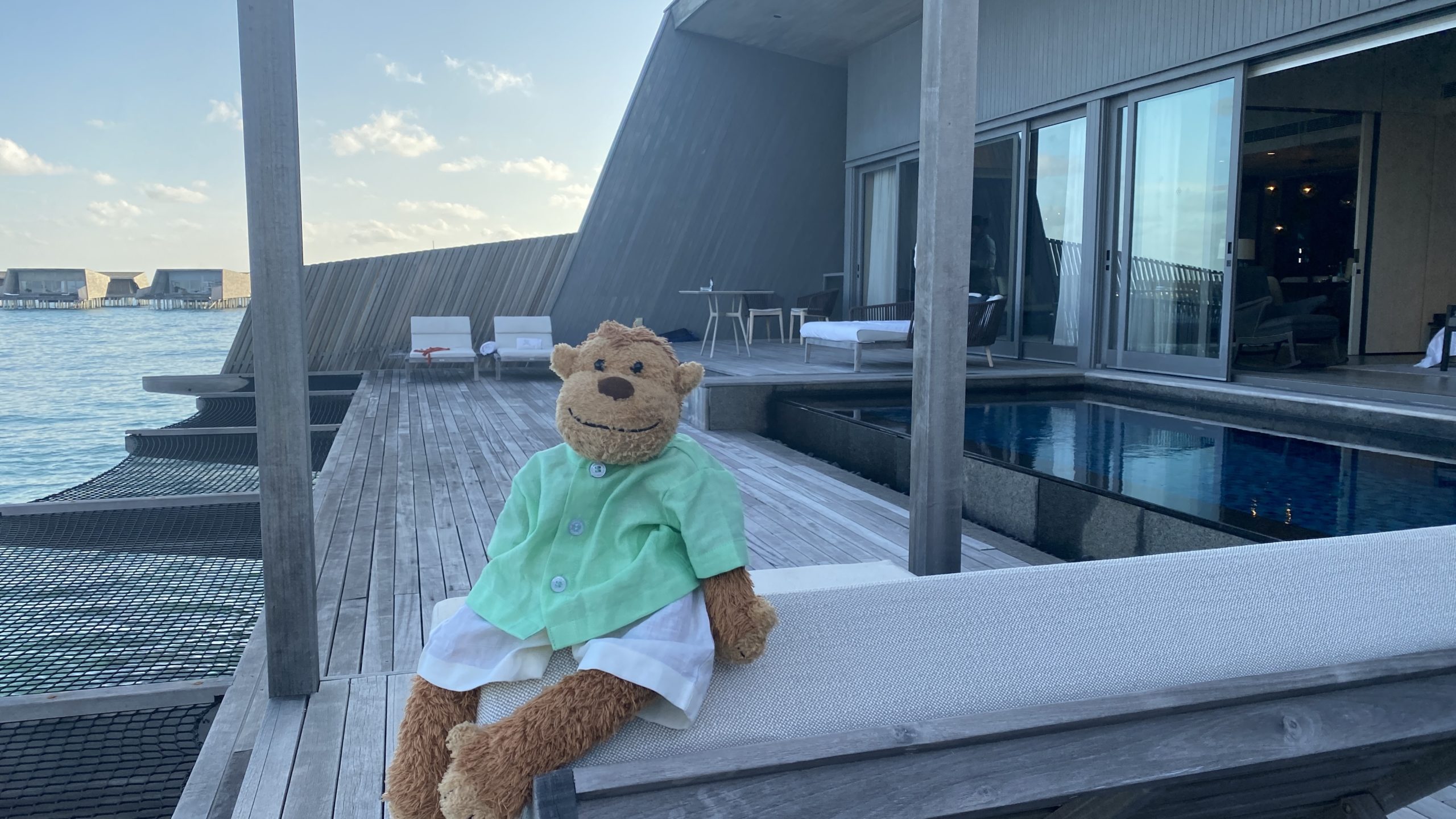 a stuffed animal on a deck