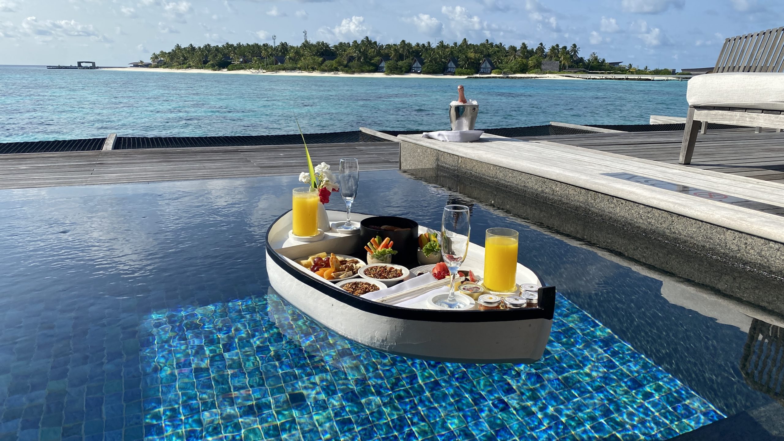 a boat with food on it in the water