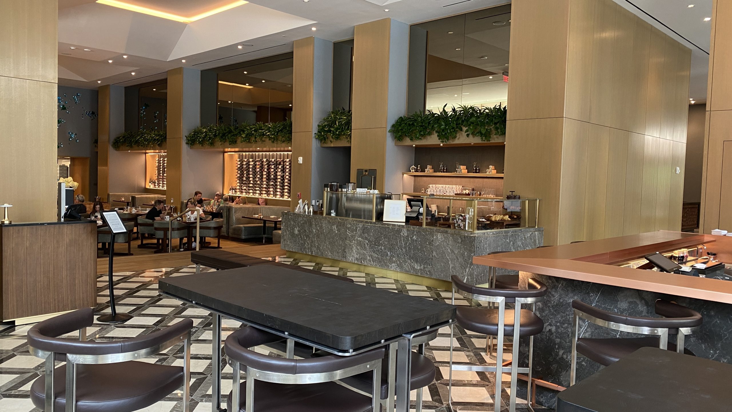 a restaurant with tables and chairs