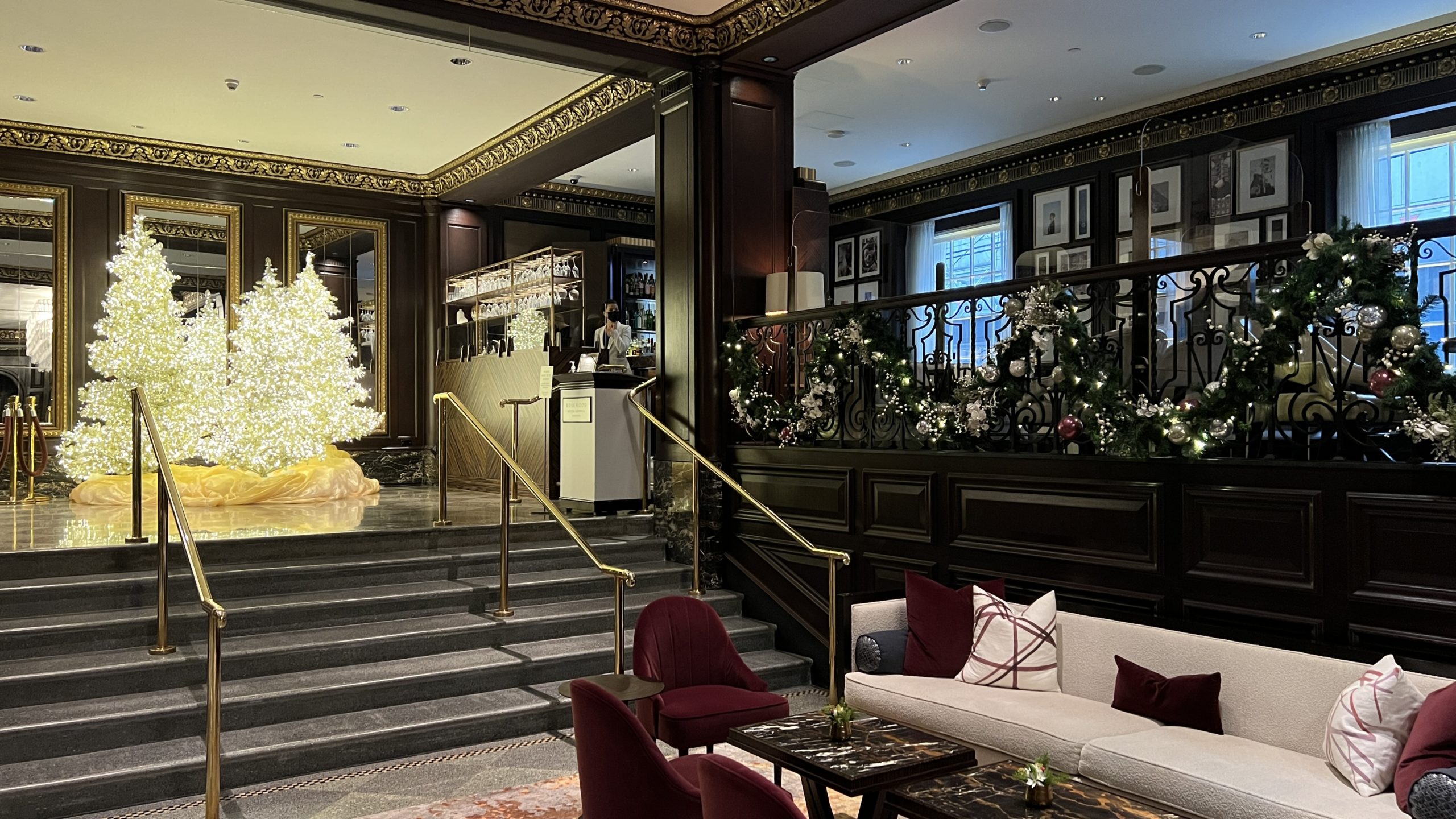 a room with a staircase and a couch