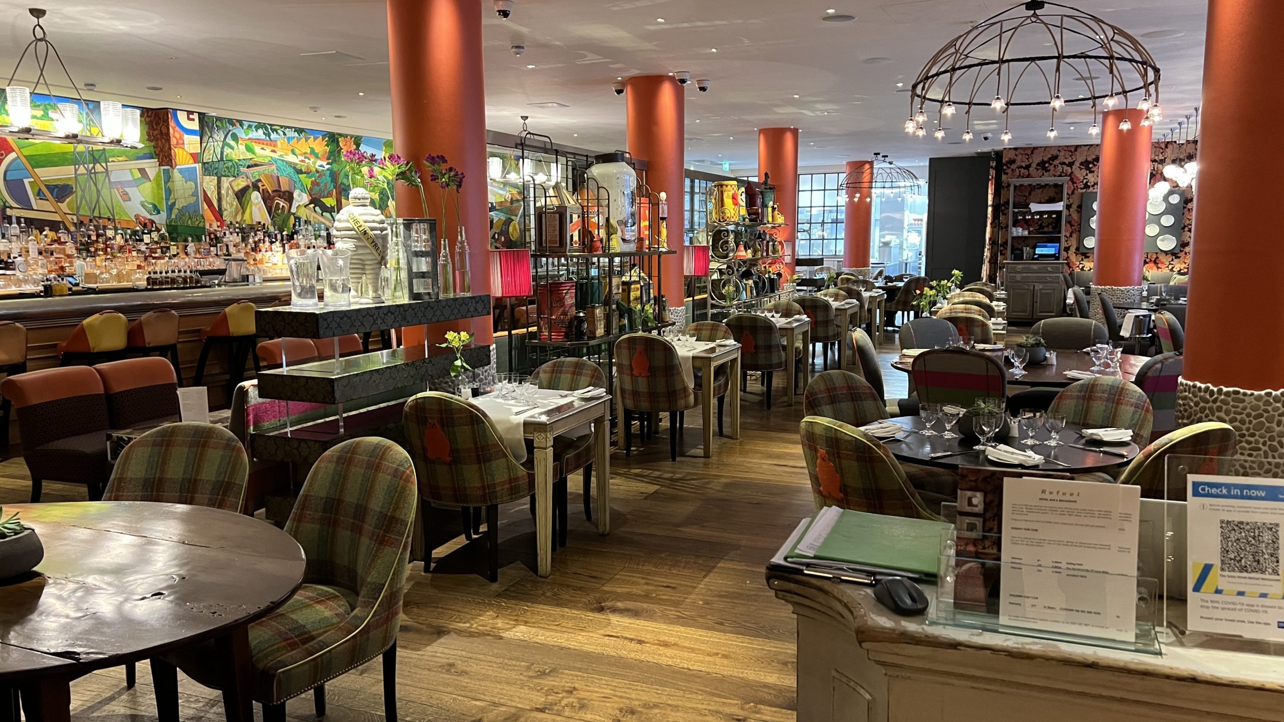 a restaurant with tables and chairs