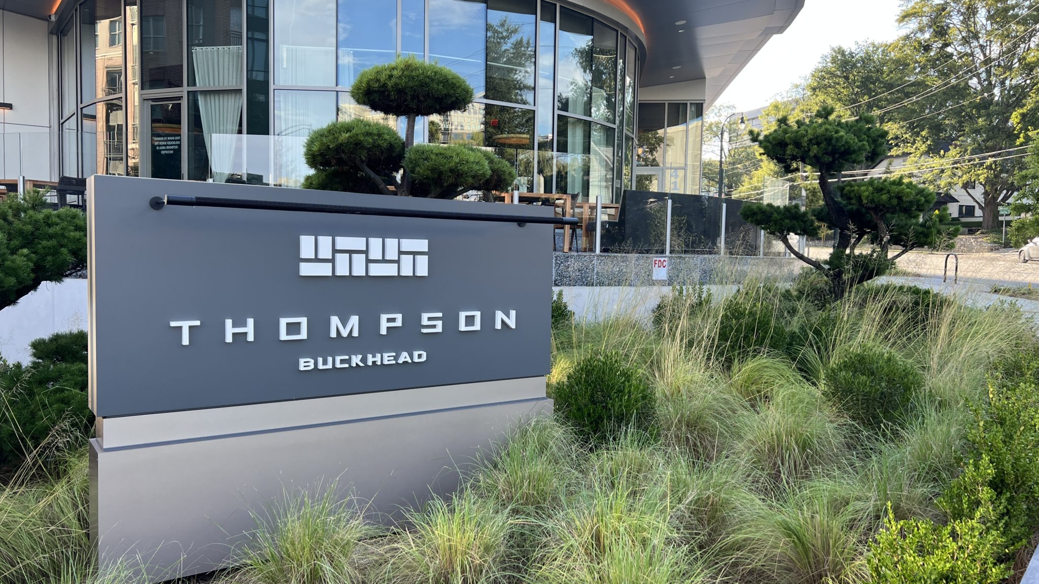 a sign in front of a building