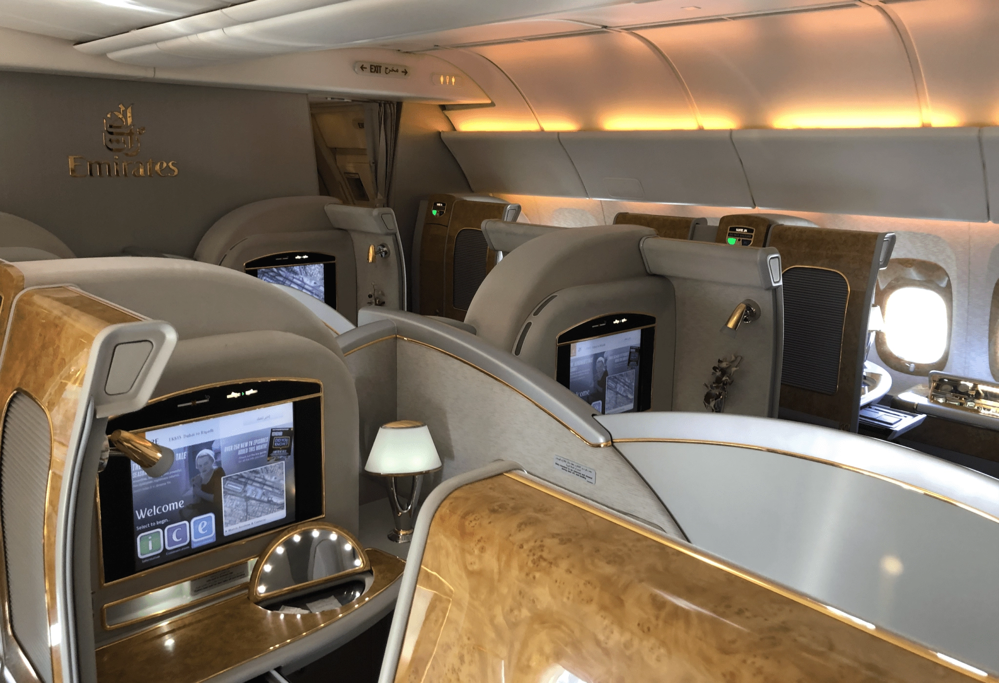 a tv and a table in an airplane