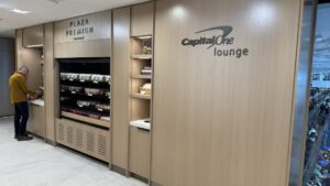 a storefront with shelves and a sign