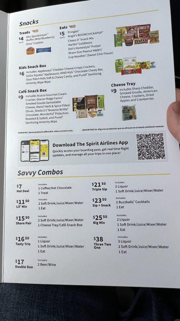 a hand holding a menu