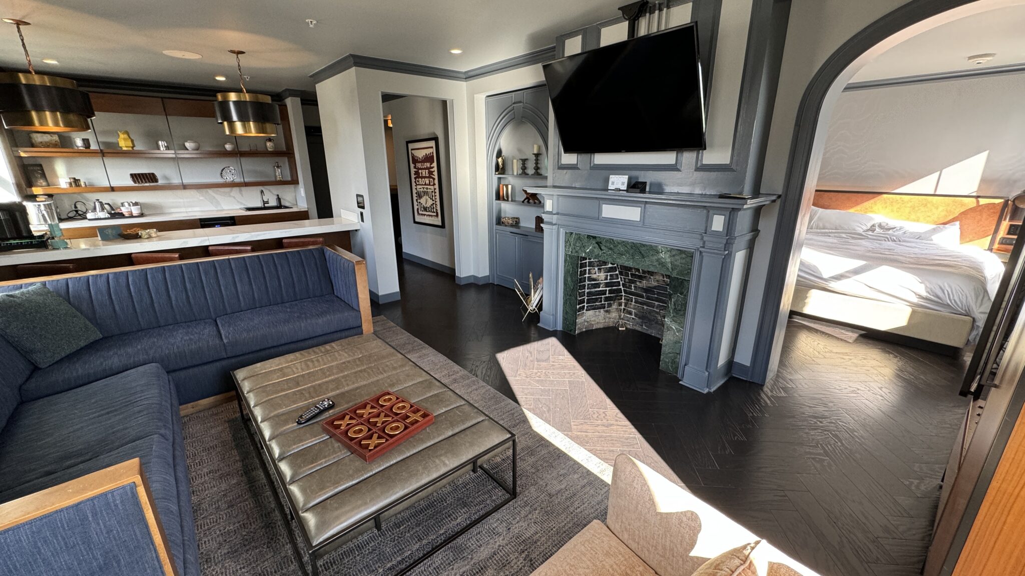a living room with a fireplace and a couch