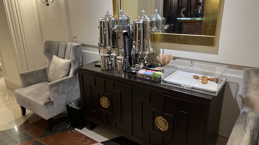 a group of silver containers on a counter