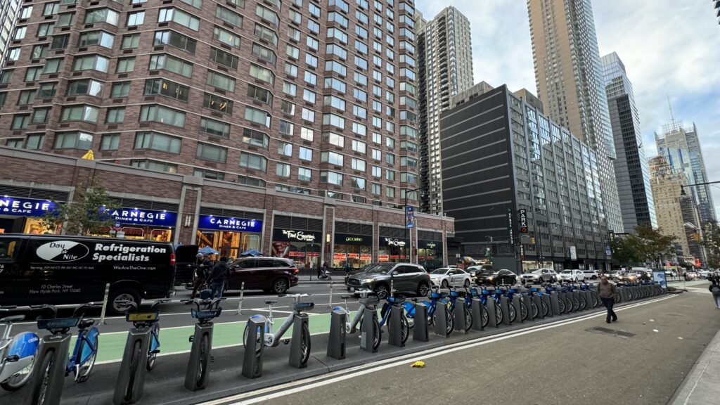 a row of bicycles on a street