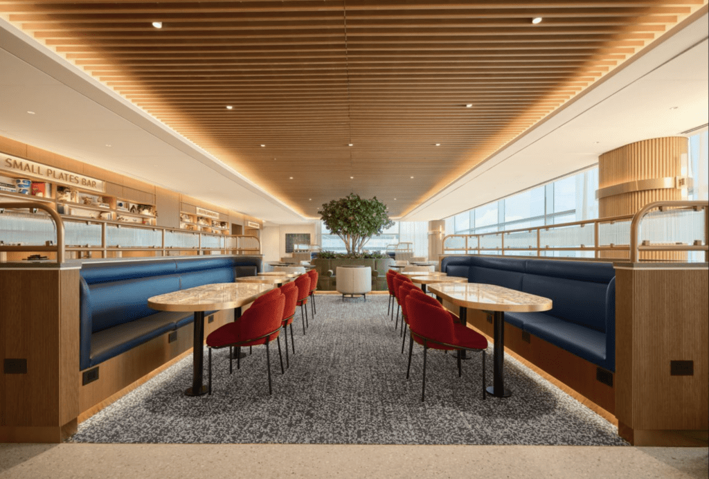 a room with tables and benches