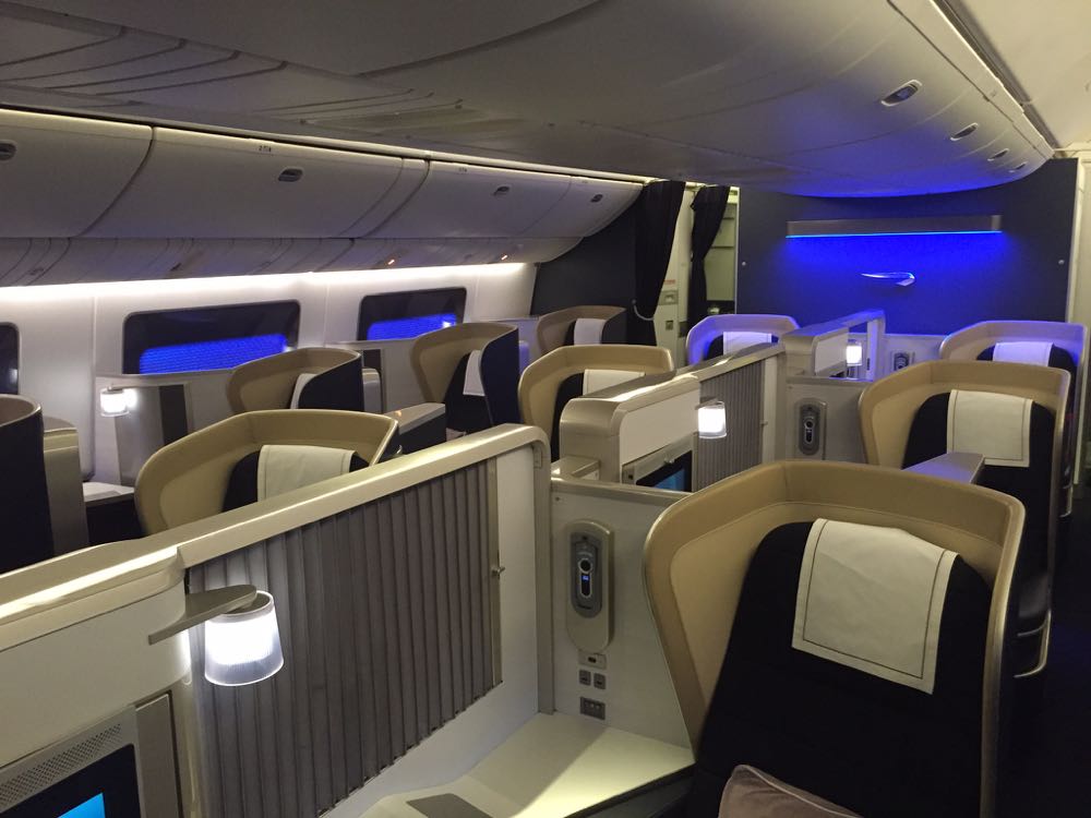 a plane with seats and a blue light
