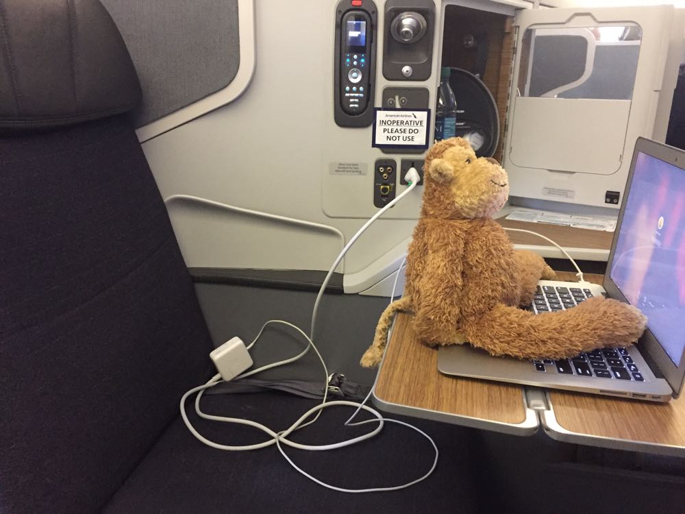 a stuffed animal on a laptop