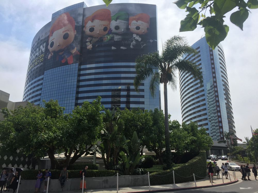 a tall building with cartoon characters on the side