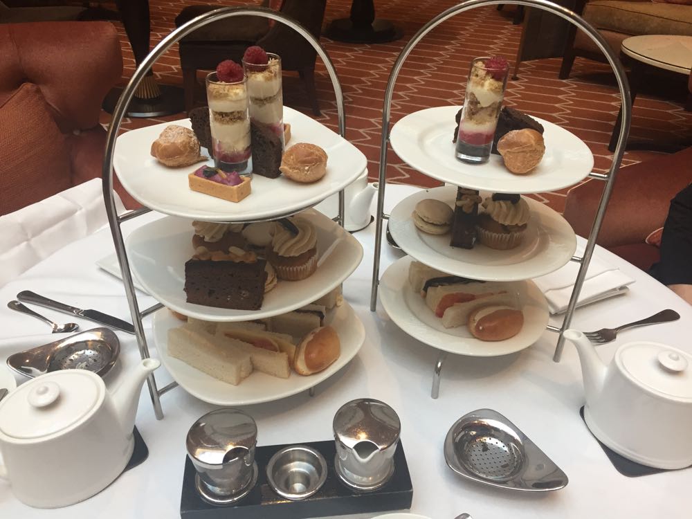 a group of desserts on plates