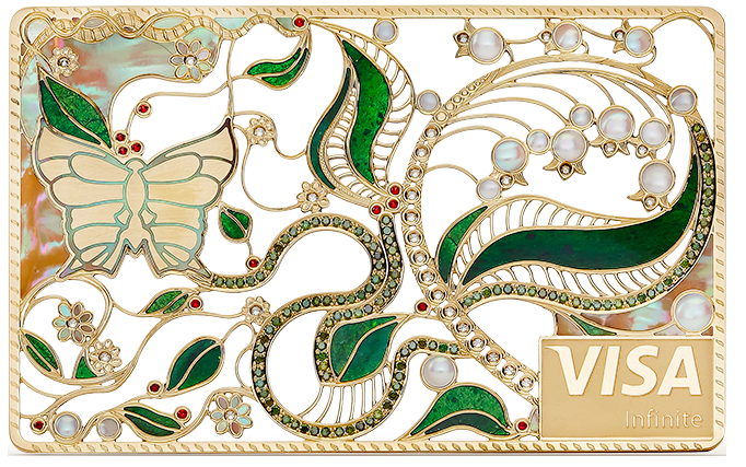 a gold and green rectangular object with a butterfly and leaves