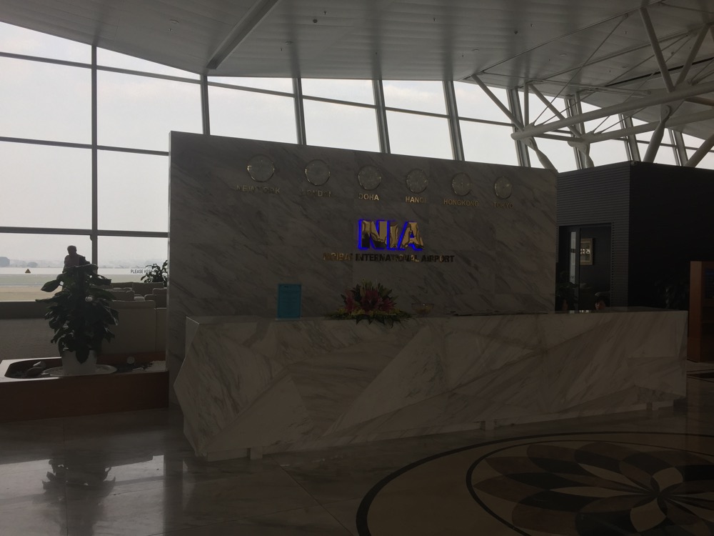 a marble reception desk in a building