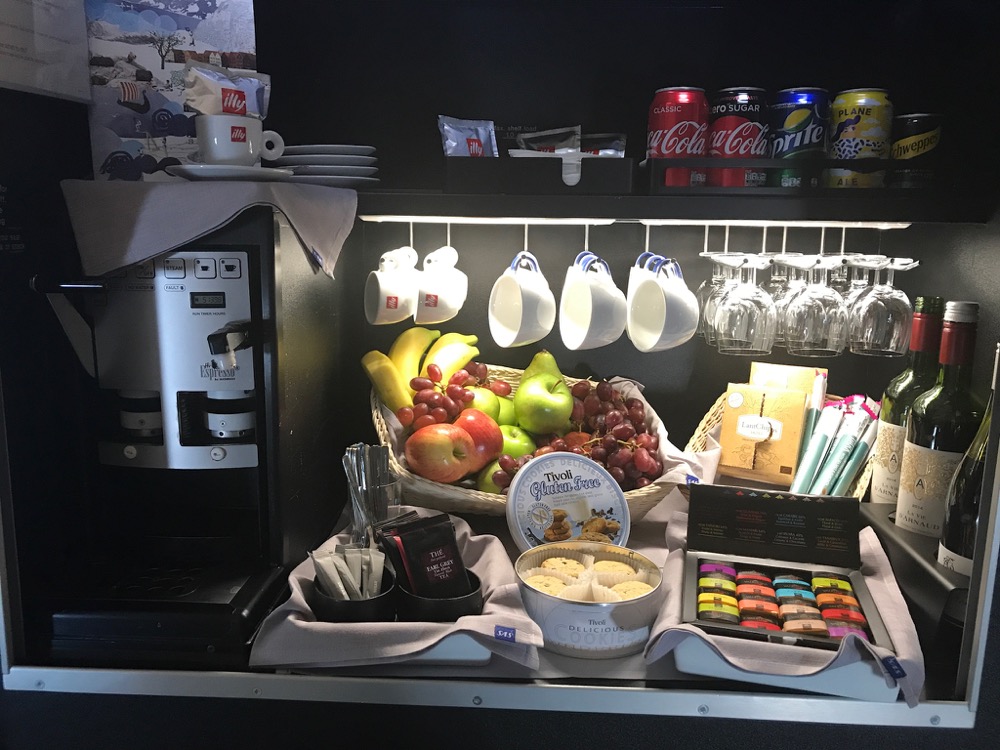 a coffee machine with a variety of fruits and drinks