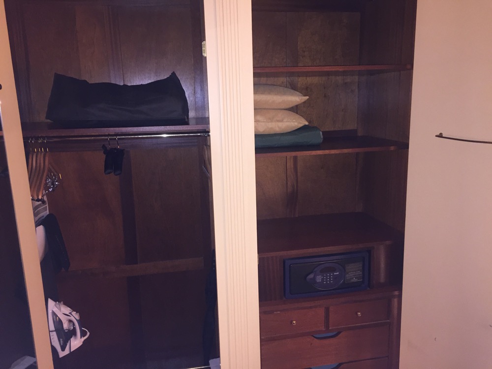a closet with shelves and a radio