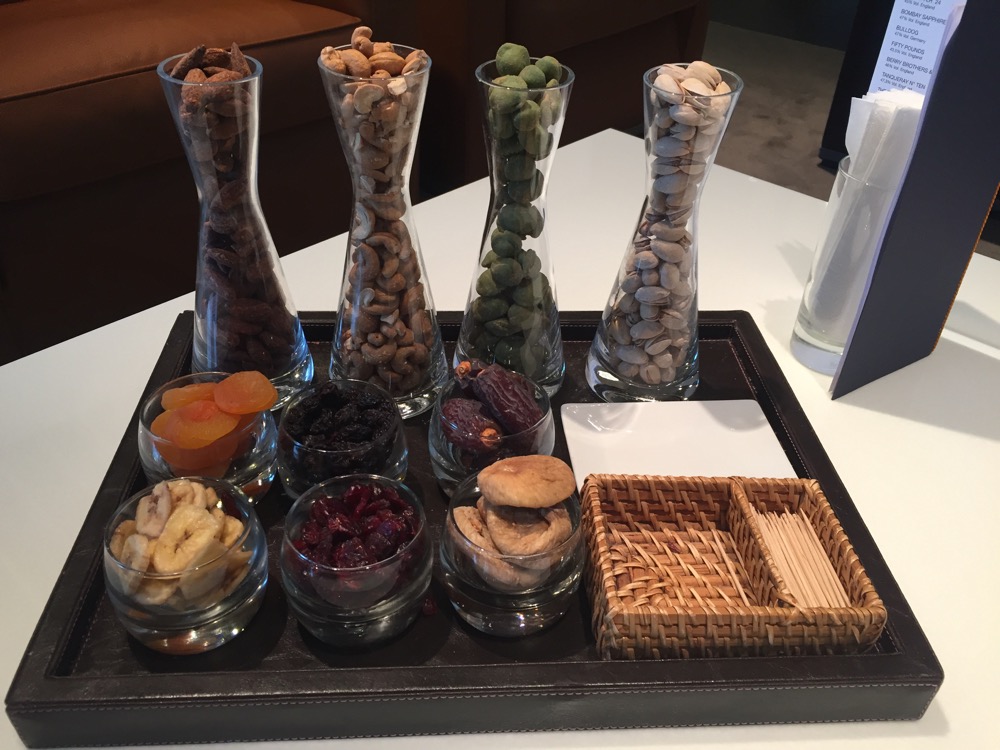 a tray with different kinds of nuts and dried fruits