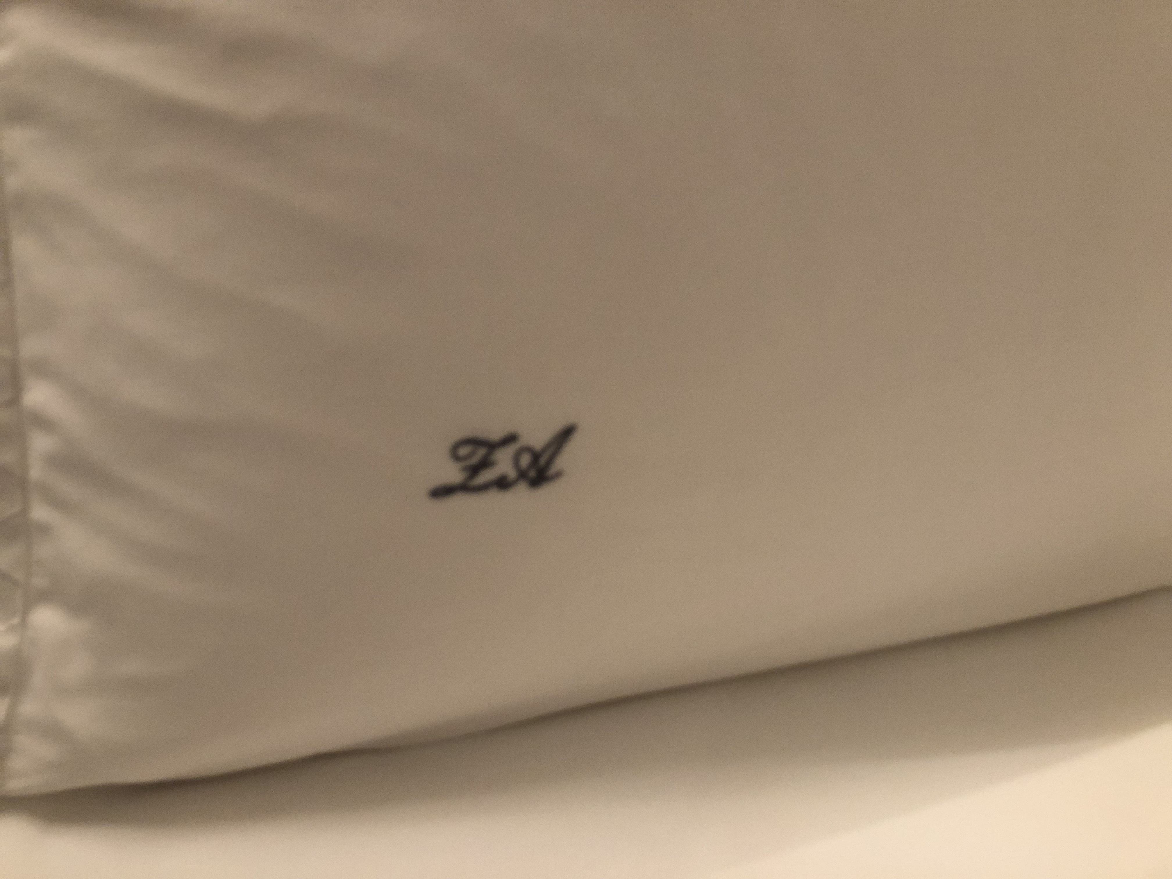 a pillow with a logo on it