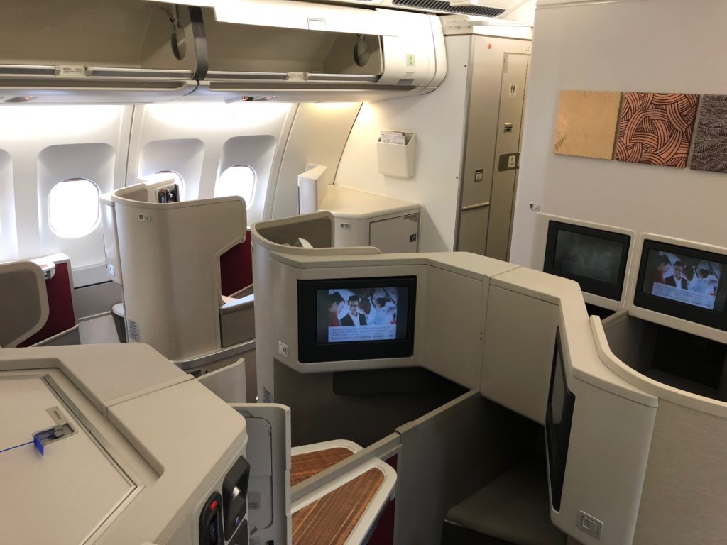 a tv in a cabin of an airplane