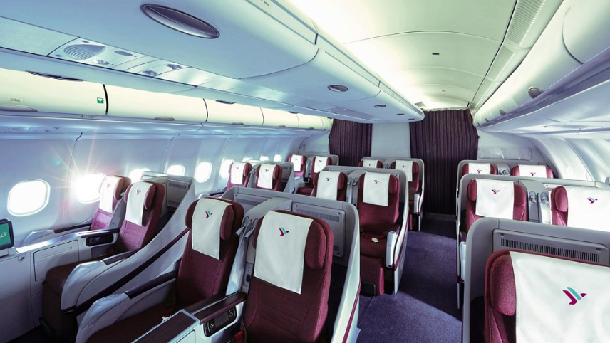 a plane with seats and a white curtain