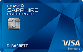 a blue credit card with silver text and a symbol