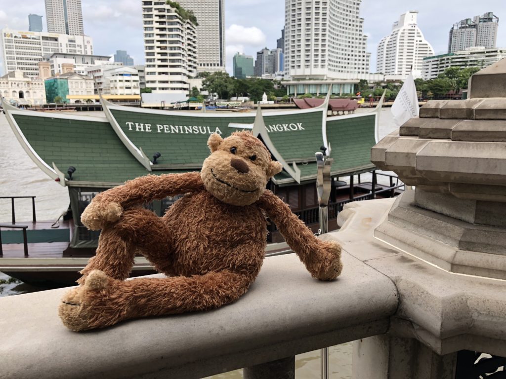 a stuffed animal on a ledge