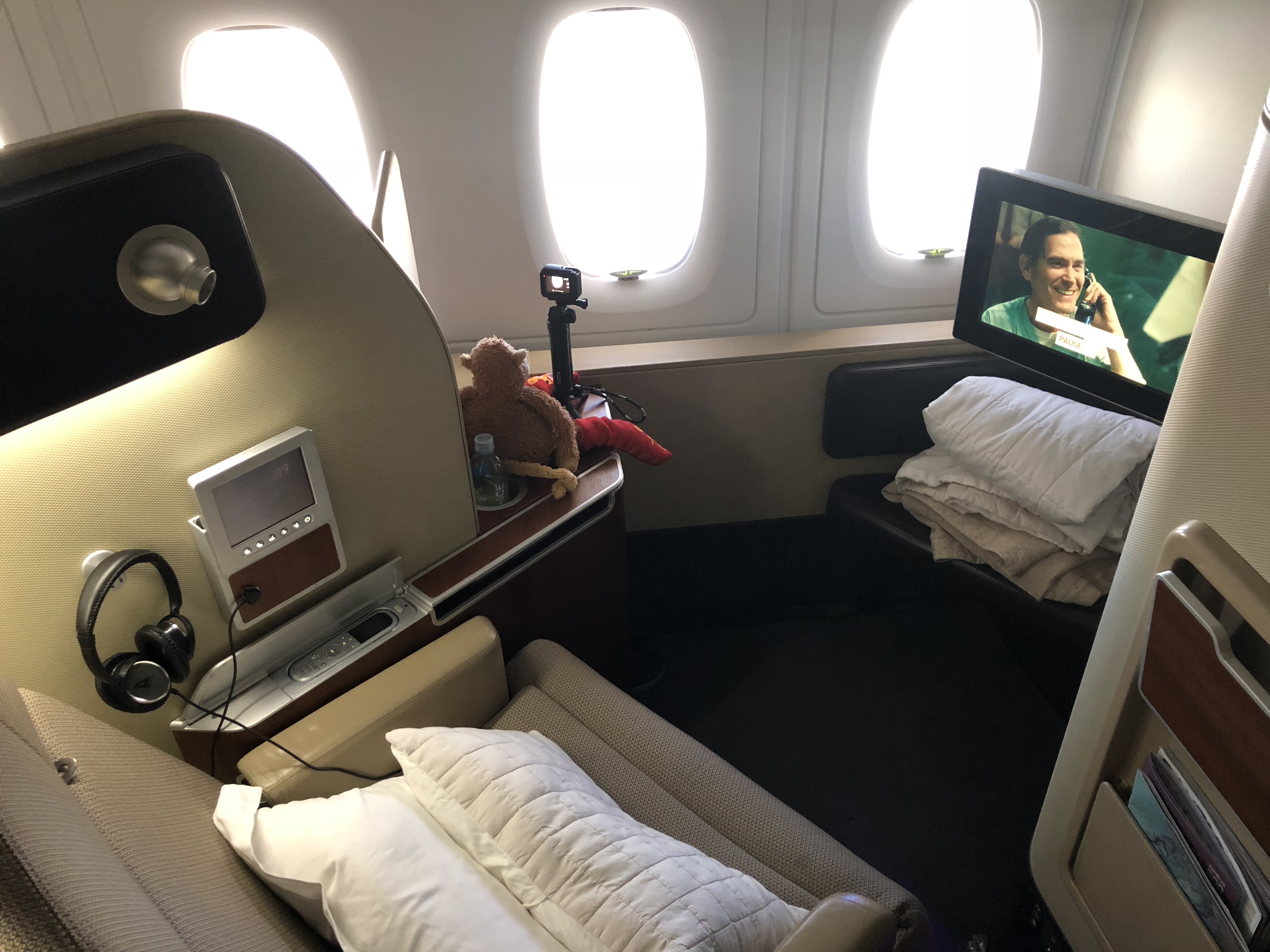 a tv on a chair in an airplane