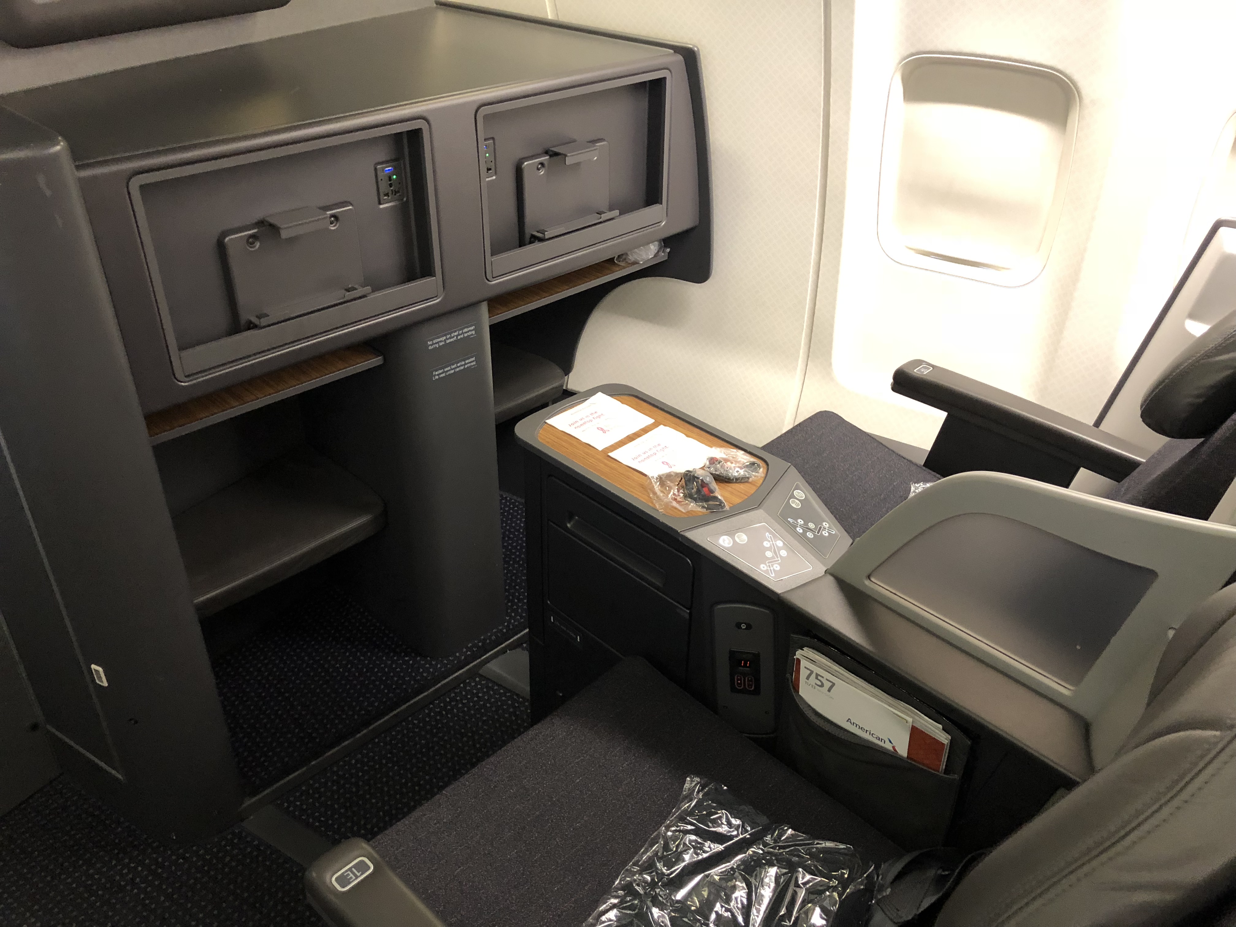 an airplane with a desk and a chair